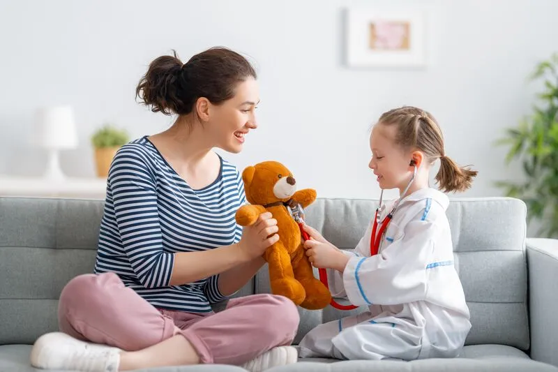 Babysitter with dress up nurse