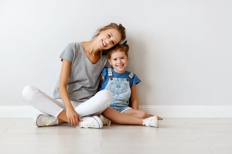 Nanny sitting with child