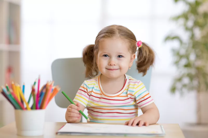 Small girl drawing